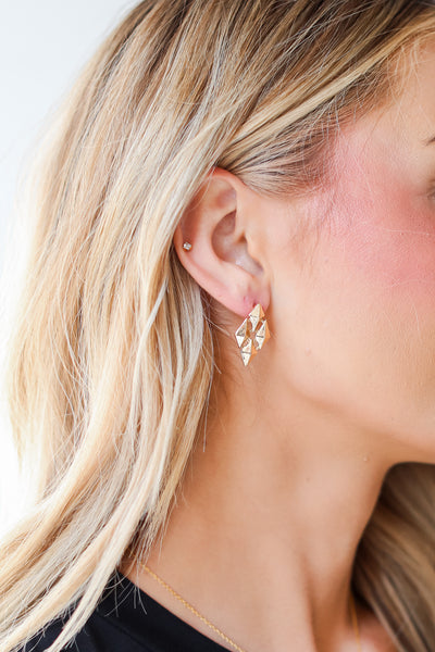 Gold Statement Stud Earrings on model