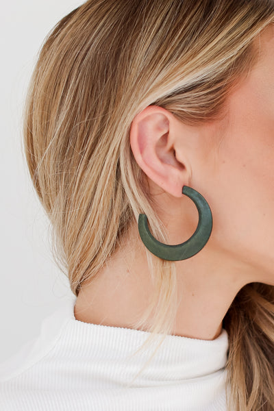 green Hoop Earrings on model