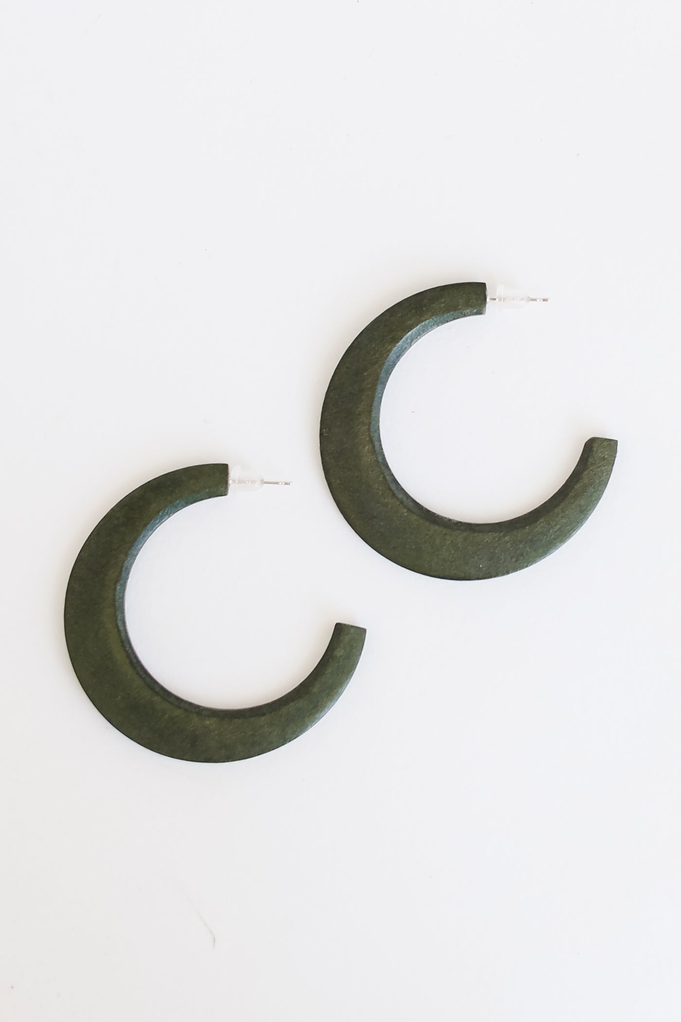 green Hoop Earrings flat lay
