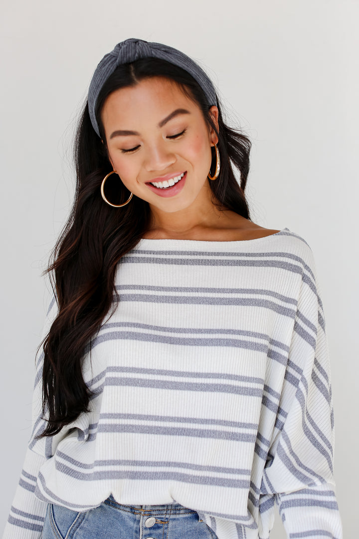 model wearing a grey Striped Knit Top