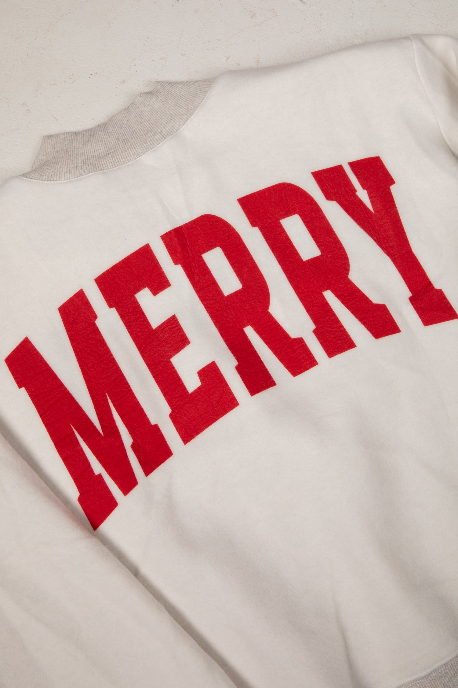 White sweatshirt with red &