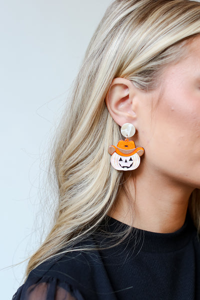 Cowboy Pumpkin Earrings on model