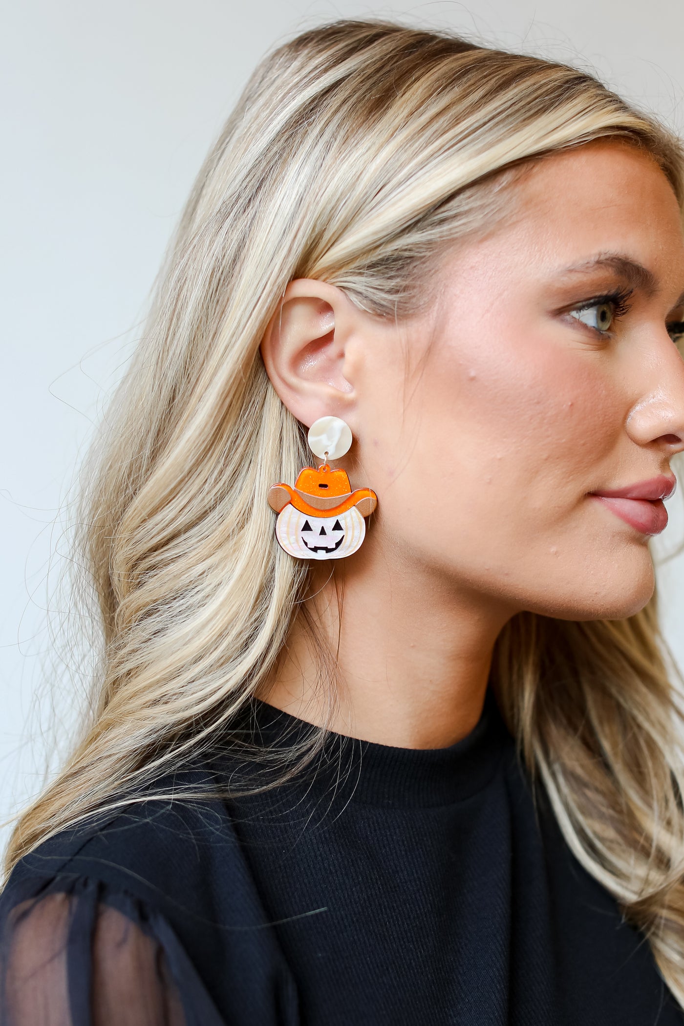 Cowboy Pumpkin Earrings close up