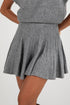 Gray knit sweater and skirt set on a plain background