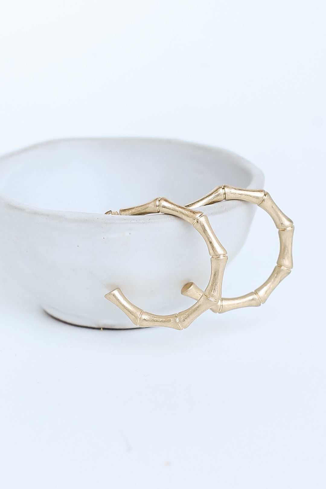 Gold Hoop Earrings flat lay