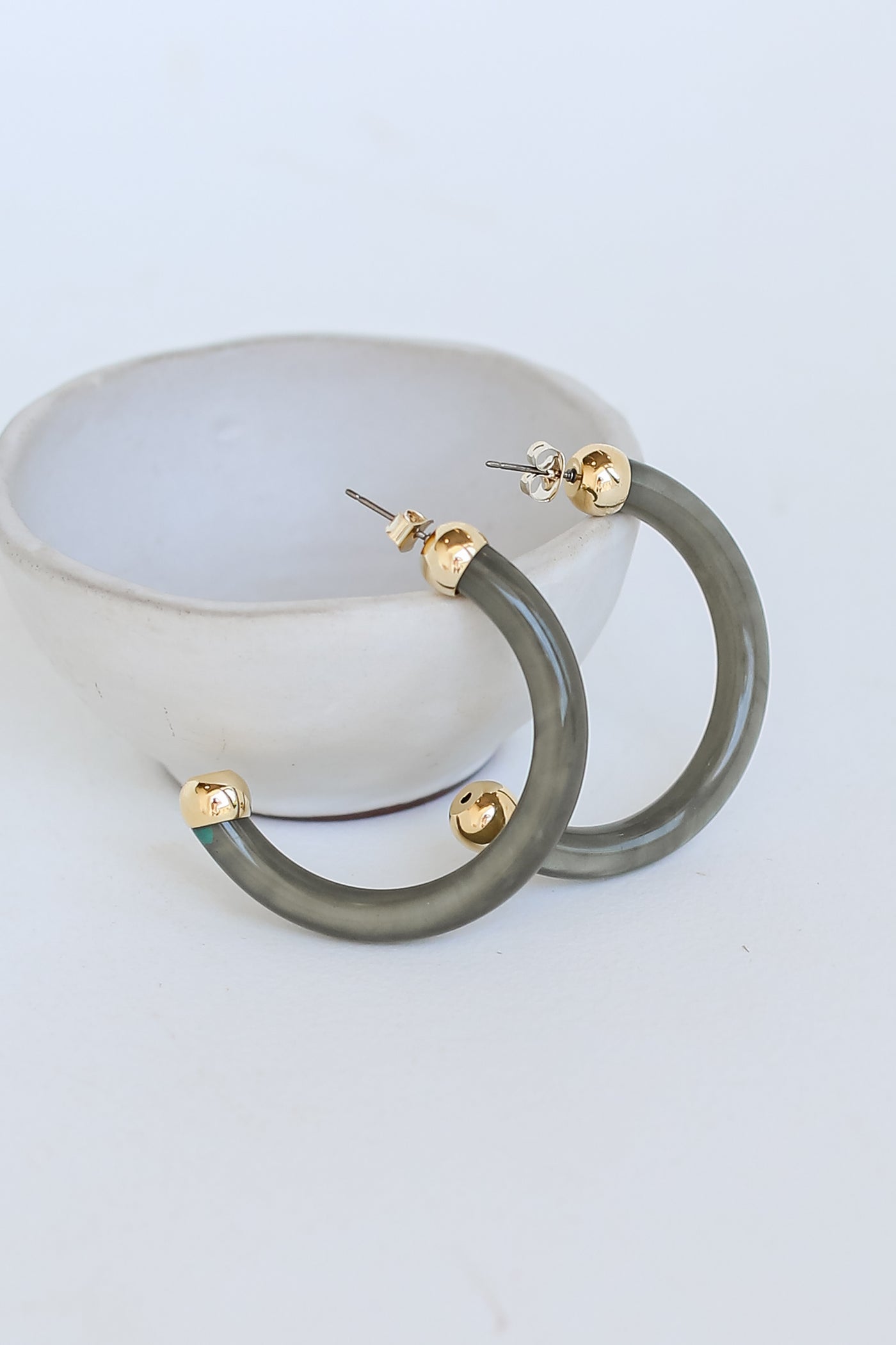 Olive Acrylic Hoop Earrings flat lay