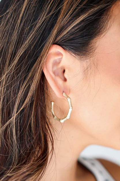 Gold Hoop Earrings on model