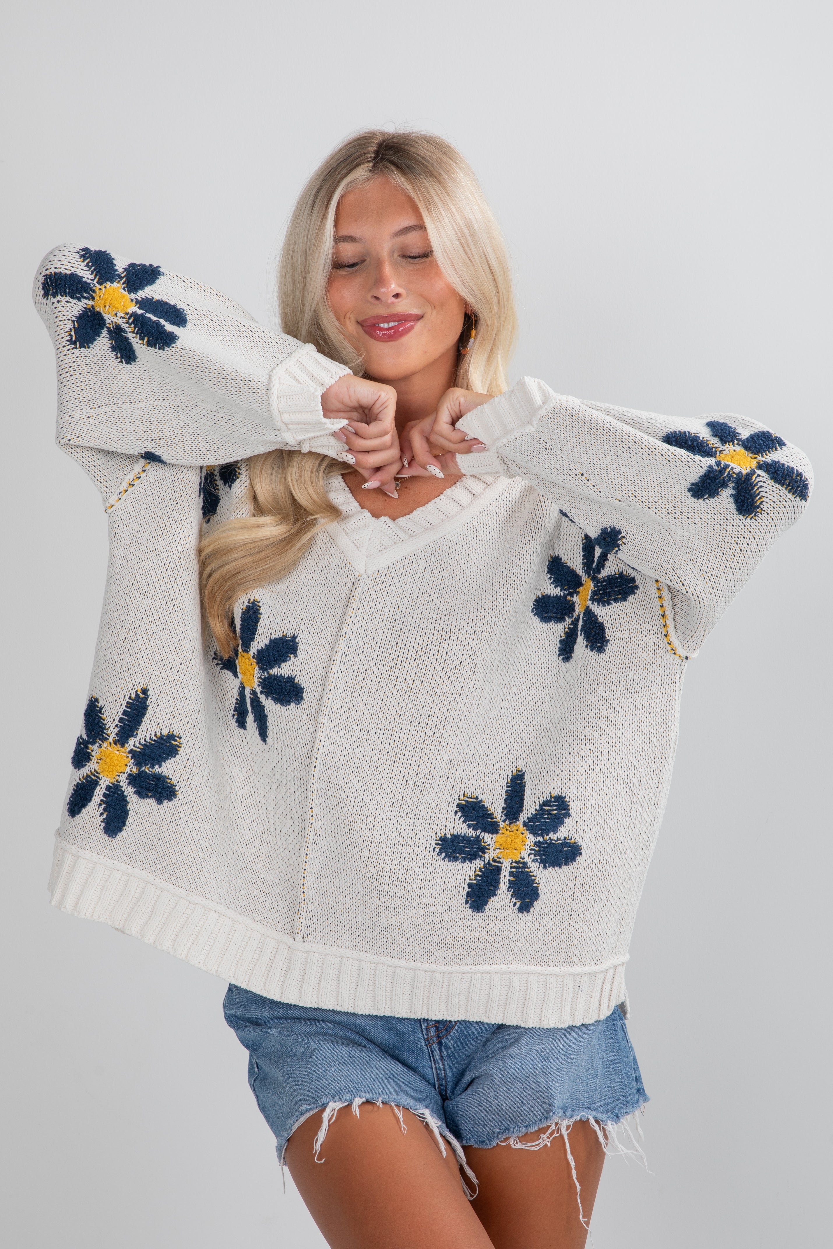 white flower sweater