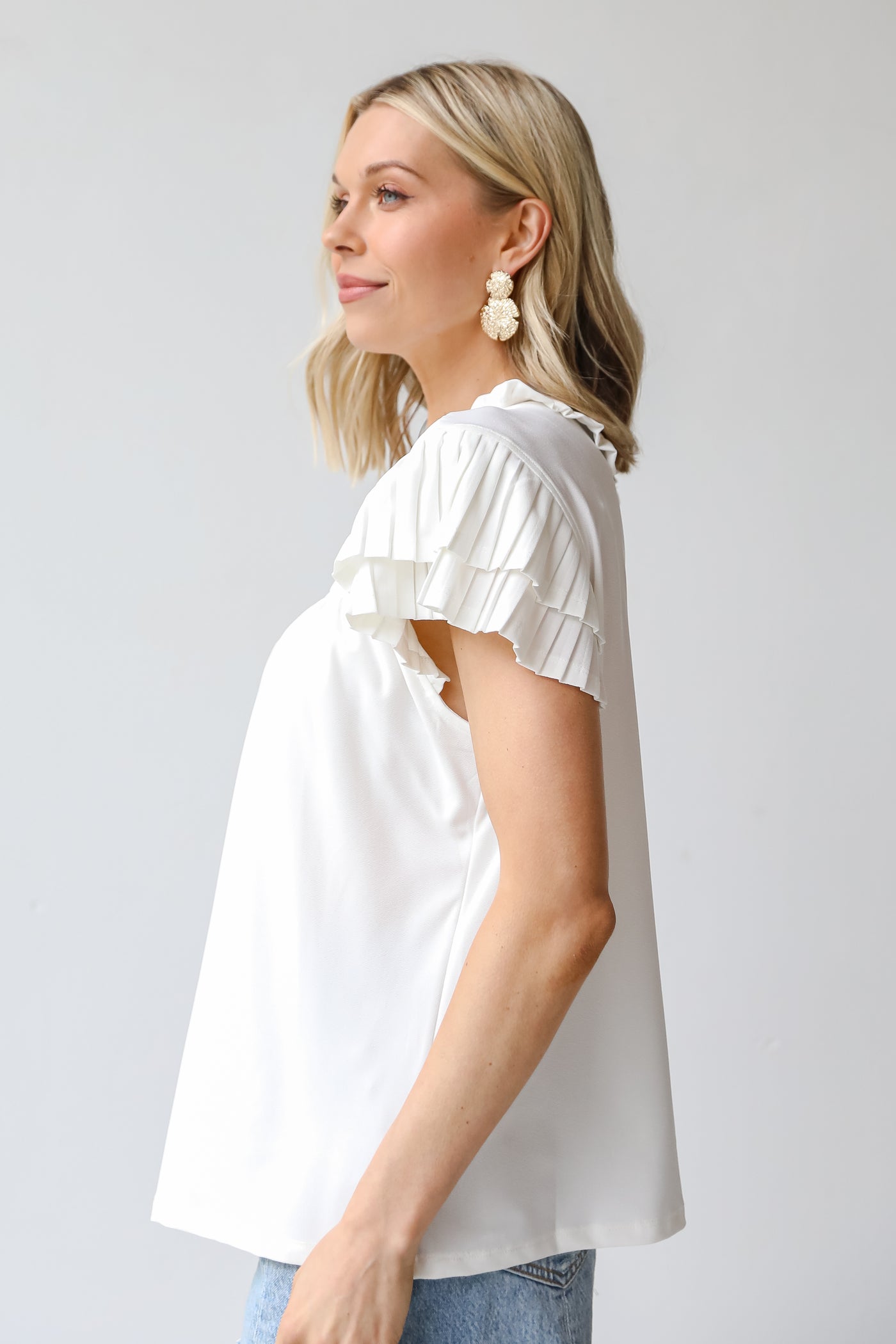 white Blouse side view