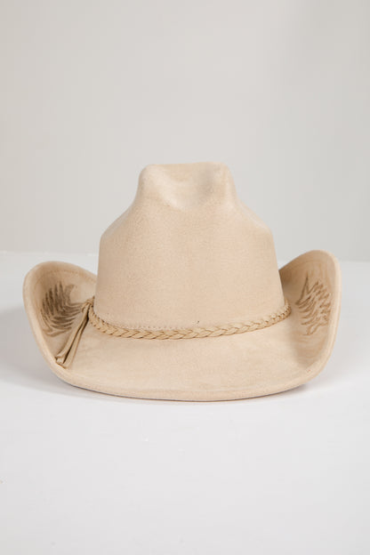 Beige cowboy hat with decorative band on a light gray background