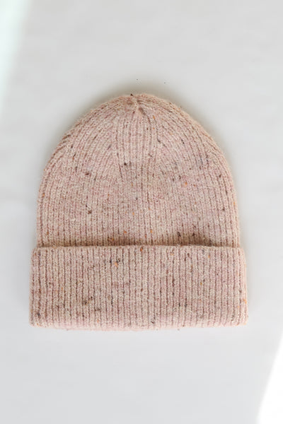 pink knit Beanie flat lay