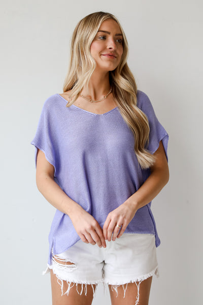 casual blue Lightweight Knit Top, Eliza Lightweight Knit Top is the perfect spring sweater. Lightweight knit sweater, with v-neck, short sleeves, and oversized fit. Pairs well with denim. Online boutique. 