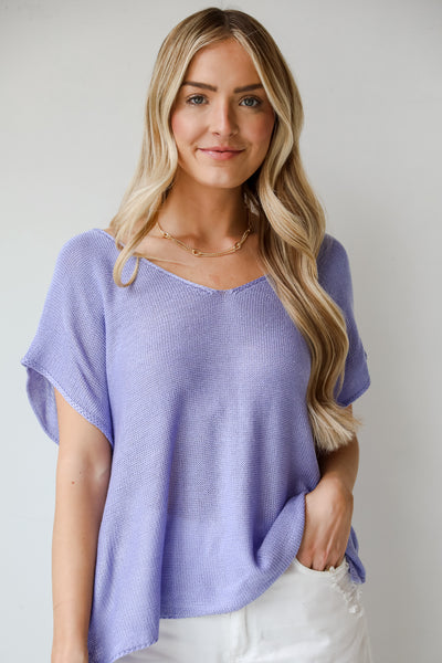 blue Lightweight Knit Top, Eliza Lightweight Knit Top is the perfect spring sweater. Lightweight knit sweater, with v-neck, short sleeves, and oversized fit. Pairs well with denim. Online boutique. 