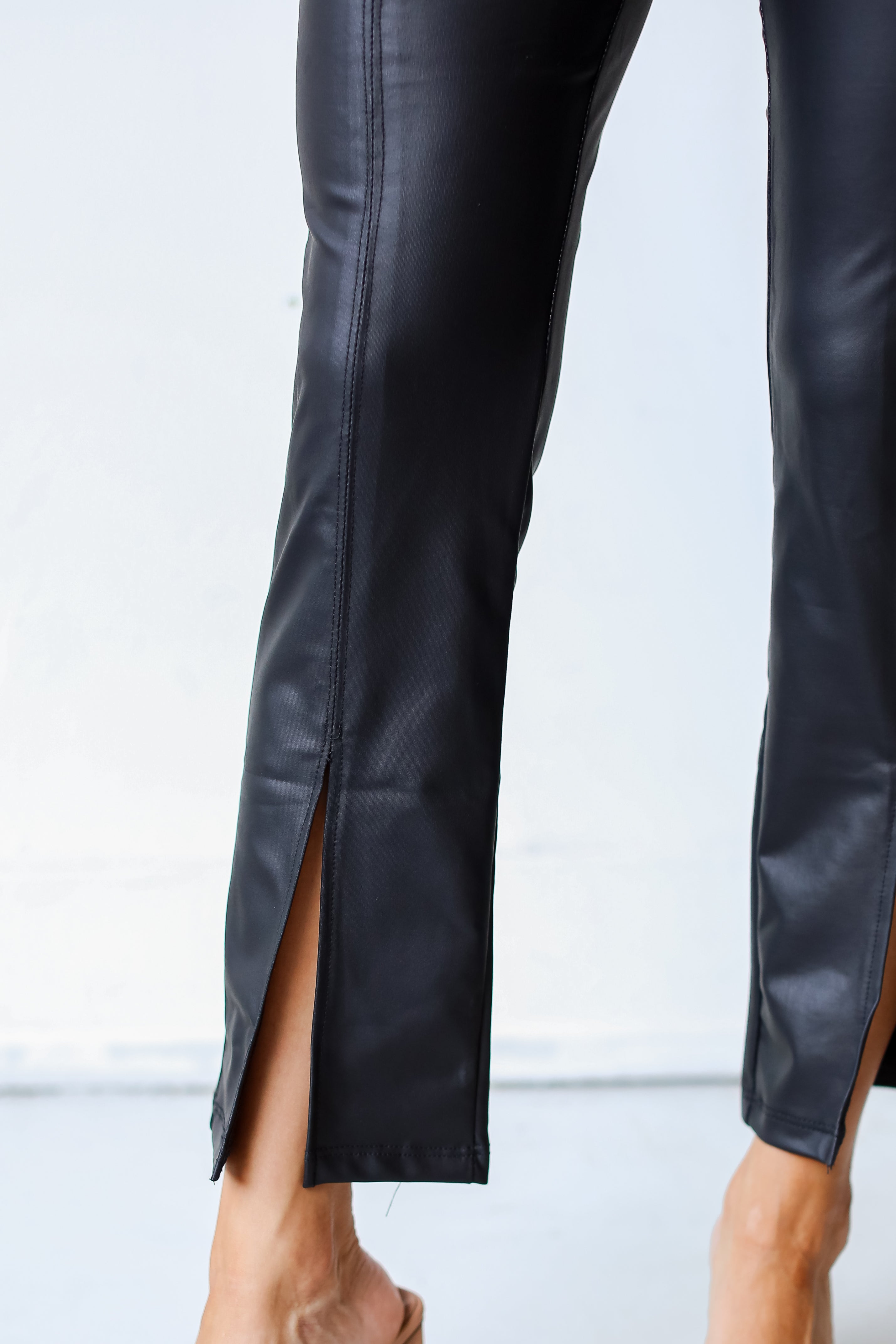 black Leather Split Hem Pants close up