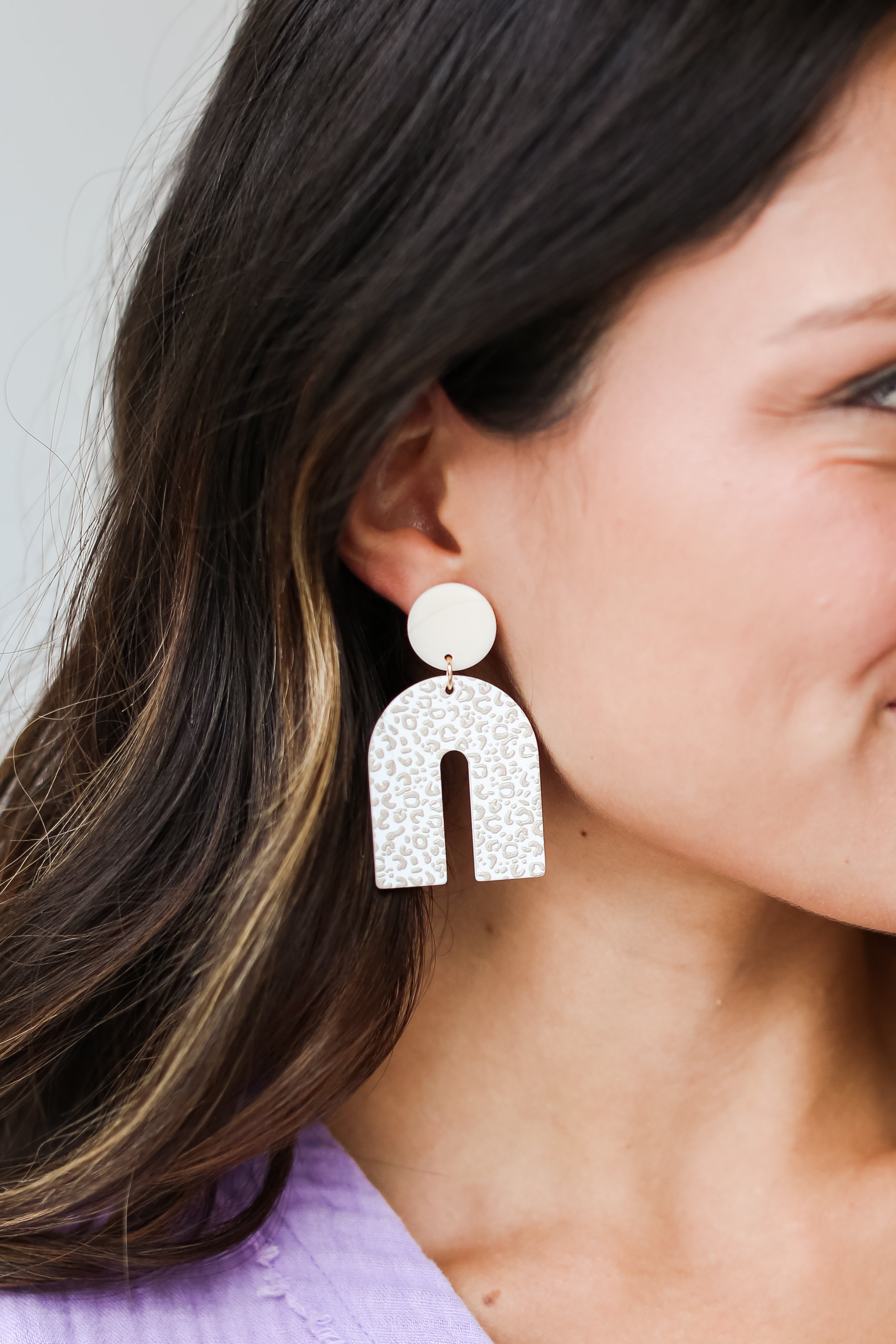 ivory Leopard Acrylic Statement Earrings on dress up model