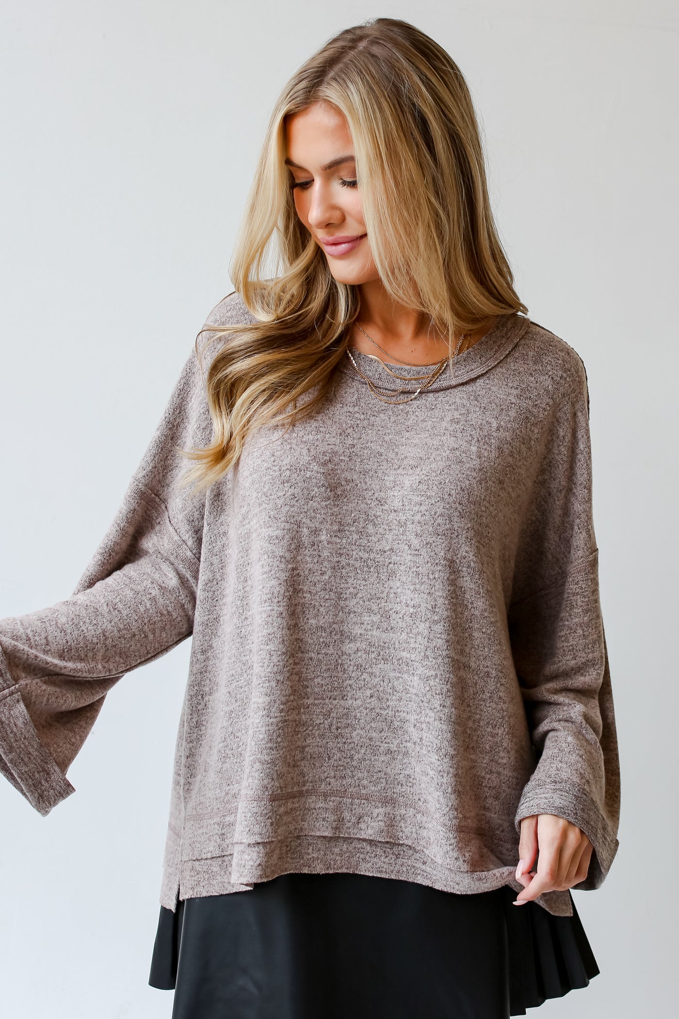 brown sweater on model
