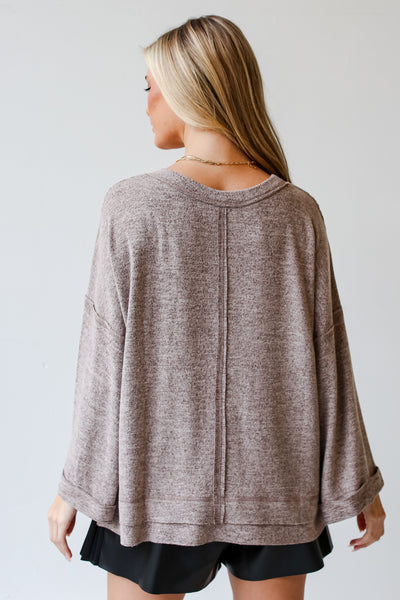 brown sweater back view