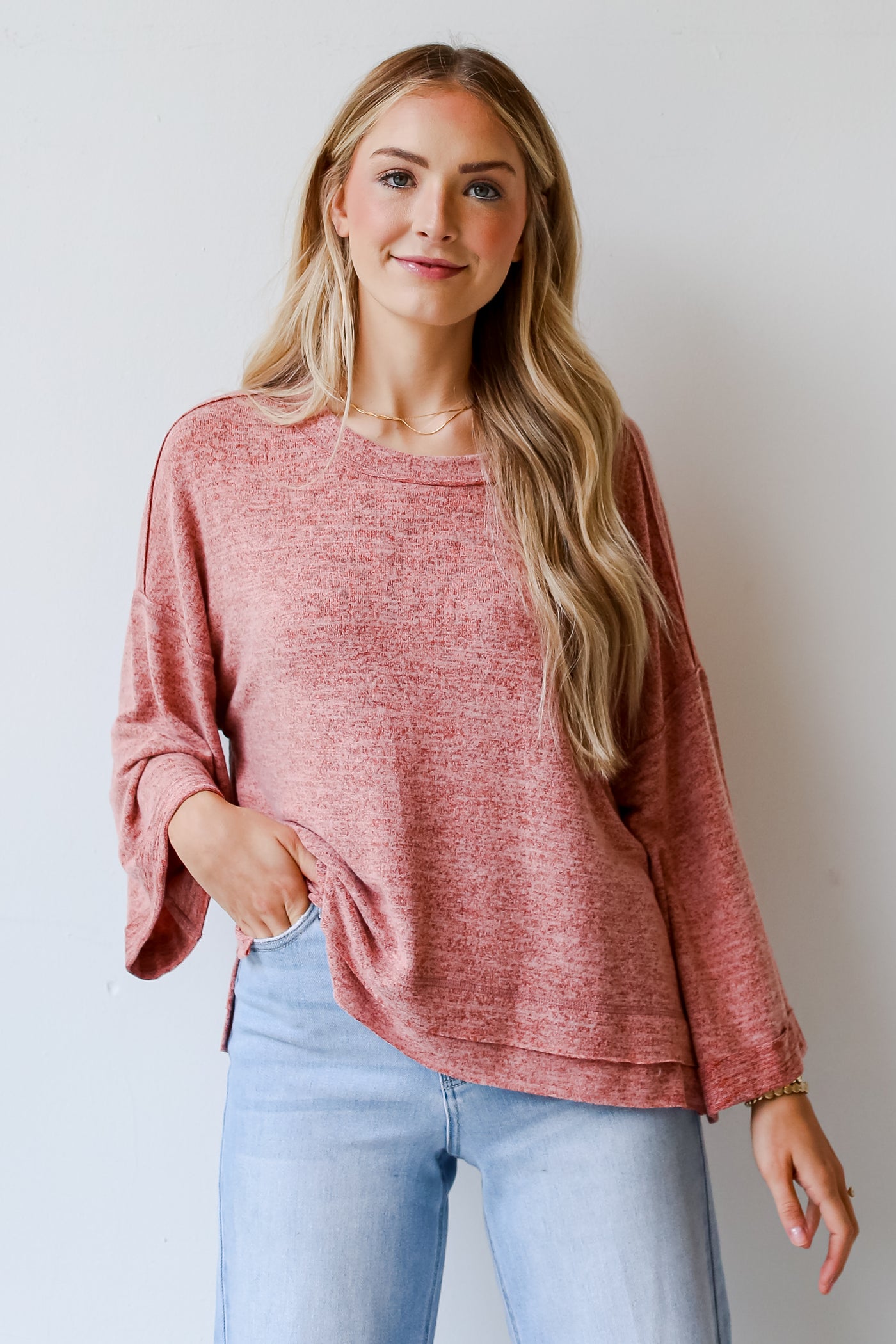 pink sweater on model