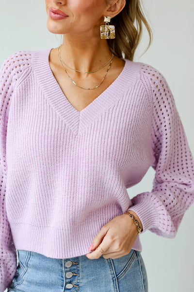 model wearing a lilac Sweater