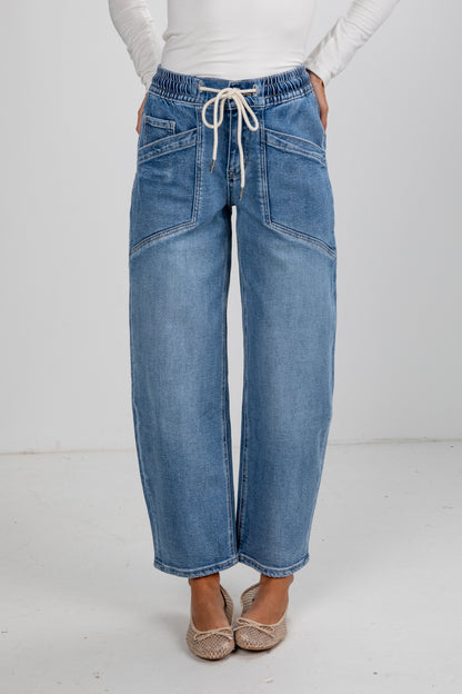 Blue jeans with a white background