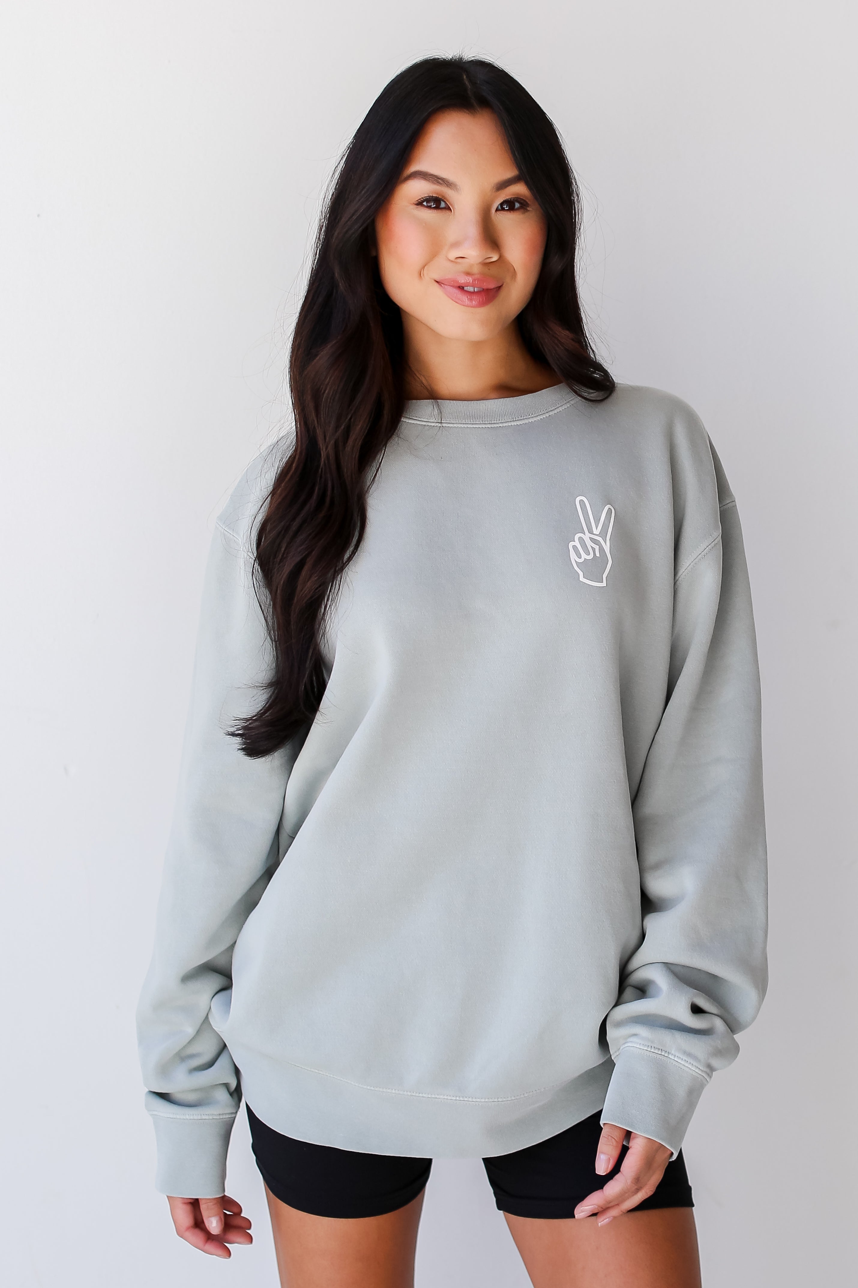 model wearing a cute Sage There Is No Place Like The Midwest Pullover