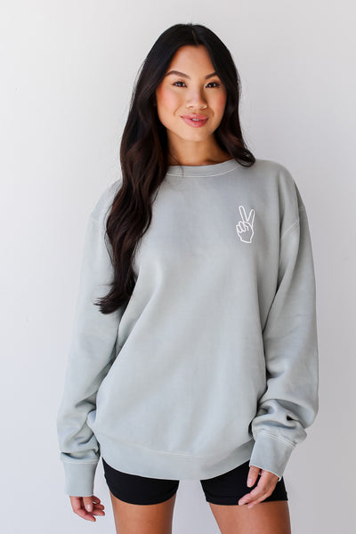 model wearing a cute Sage There Is No Place Like The Midwest Pullover