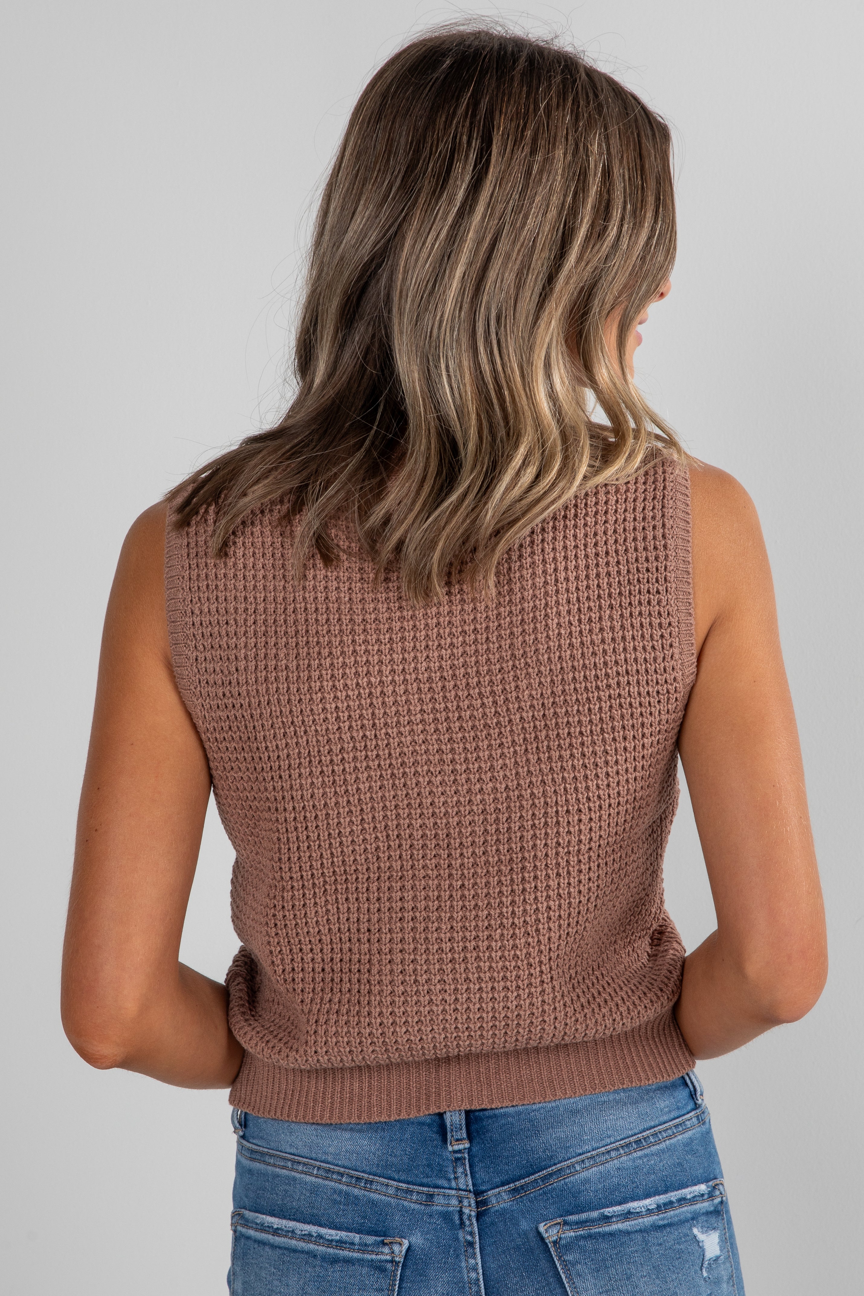 brown sleeveless top