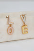 Gold earrings spelling &