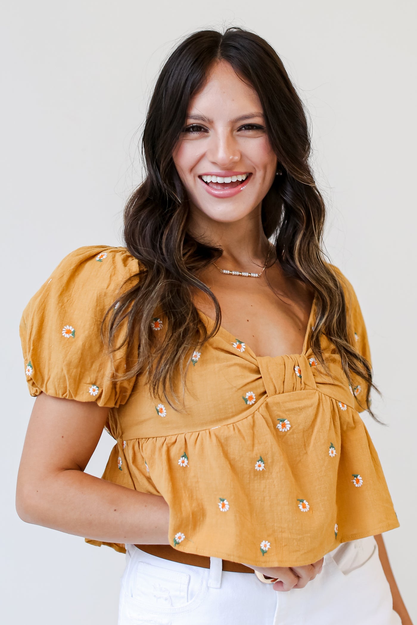 model wearing a yellow Floral Cropped Blouse