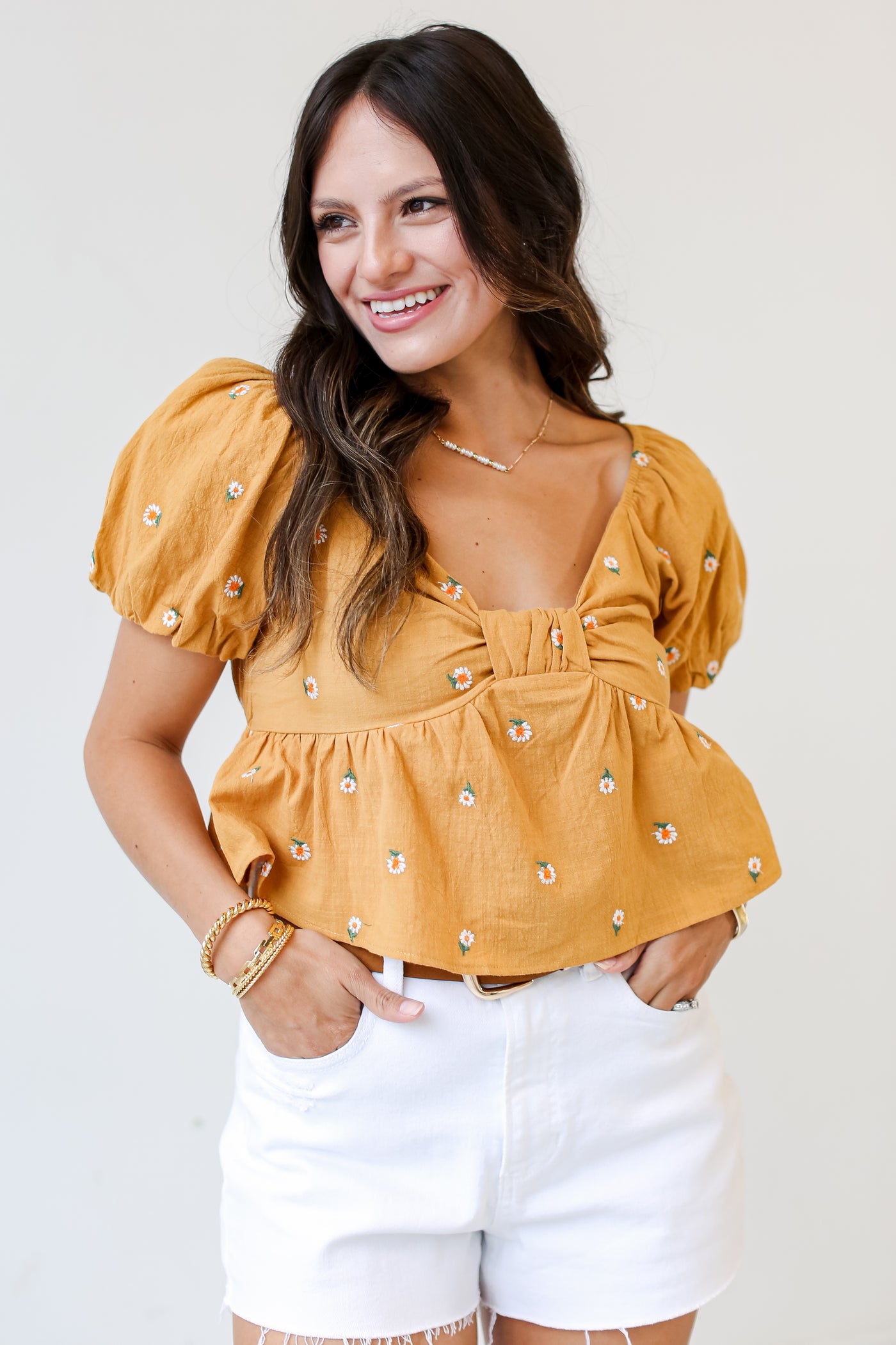 dress up model wearing a yellow Floral Cropped Blouse