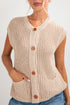 Beige knitted vest with buttons on a plain background