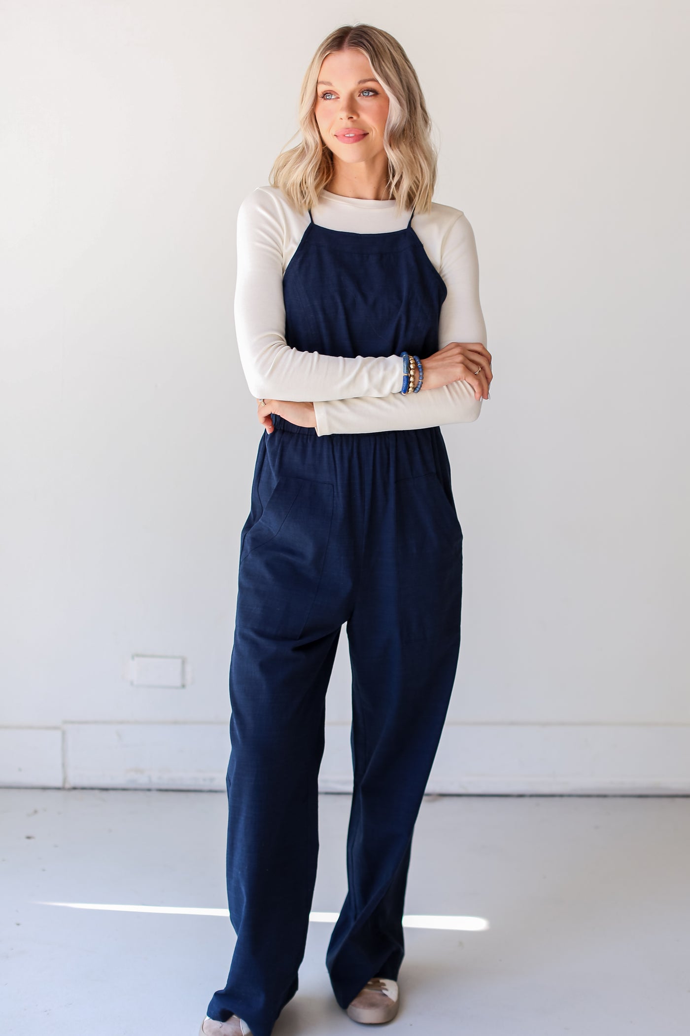 navy Wide Leg Jumpsuit with sneakers
