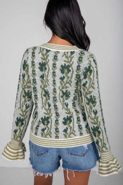green floral sweater