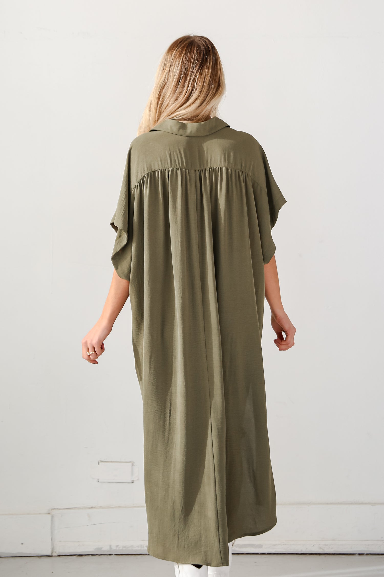 green dress on model