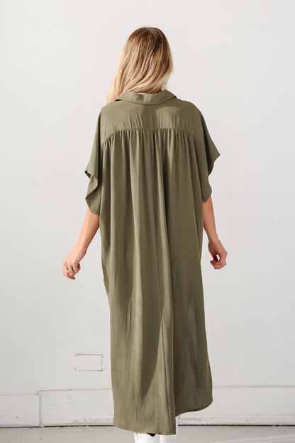 green dress on model