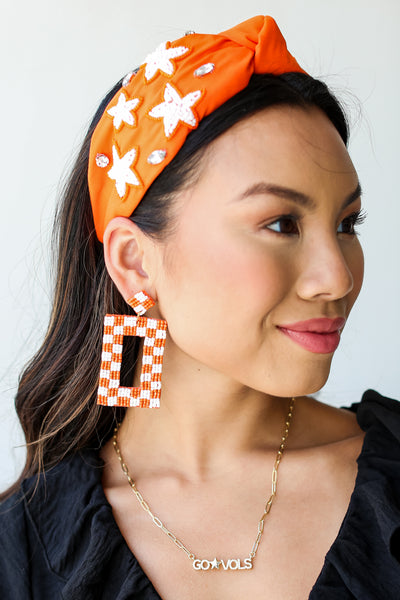 Orange + White Checkered Beaded Statement Earrings close up