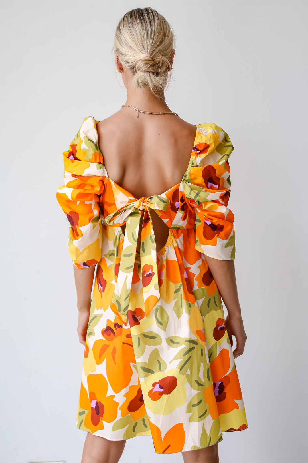 Unique Blooms Orange Floral Babydoll Mini Dress