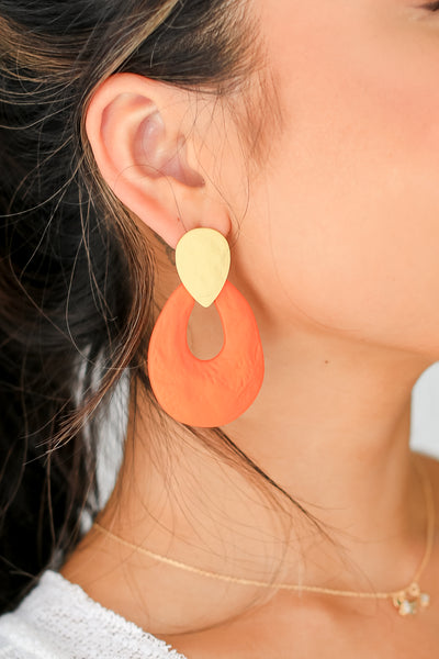 orange Statement Earrings on model