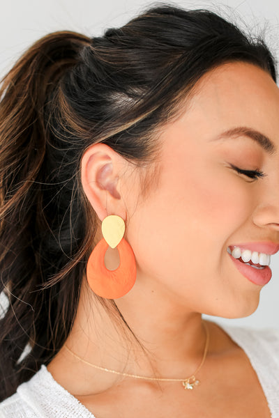 orange Statement Earrings on model