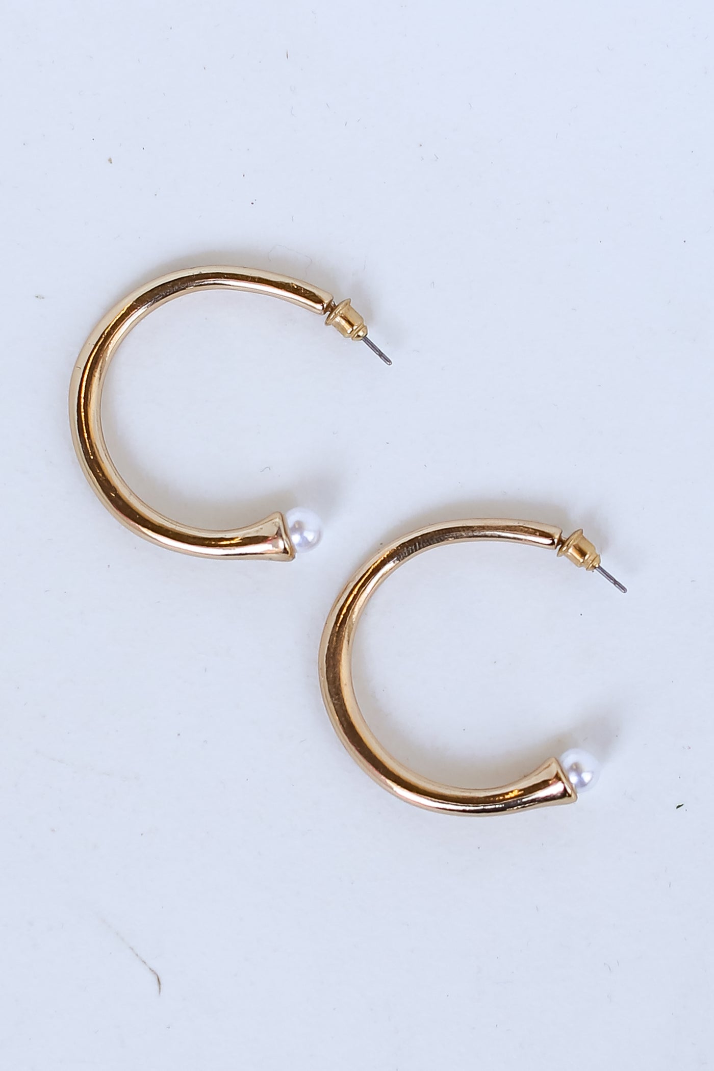 Gold Hoop Earrings flat lay