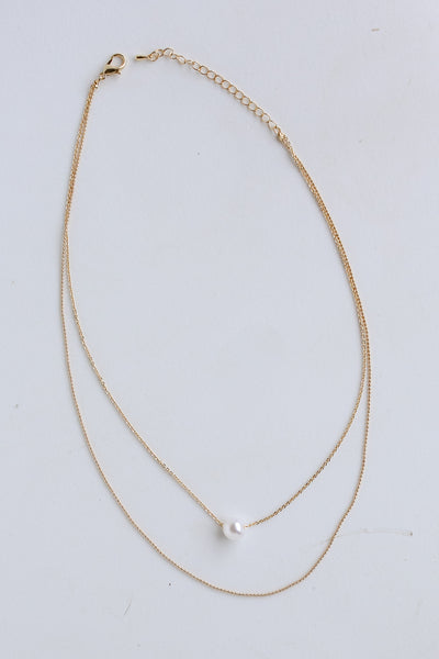 Gold Pearl Layered Chain Necklace flat lay