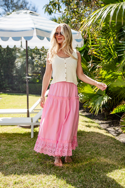 Pink tiered maxi skirt styled outdoors
