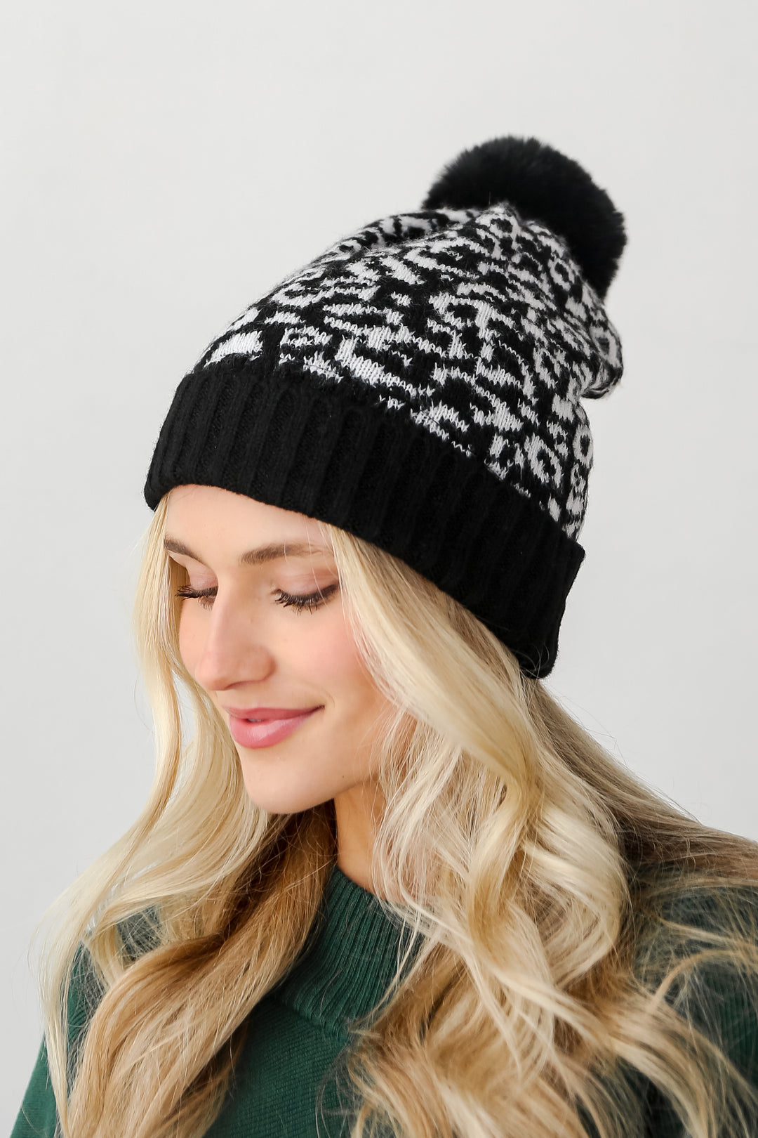 black Leopard Pom Pom Beanie on model