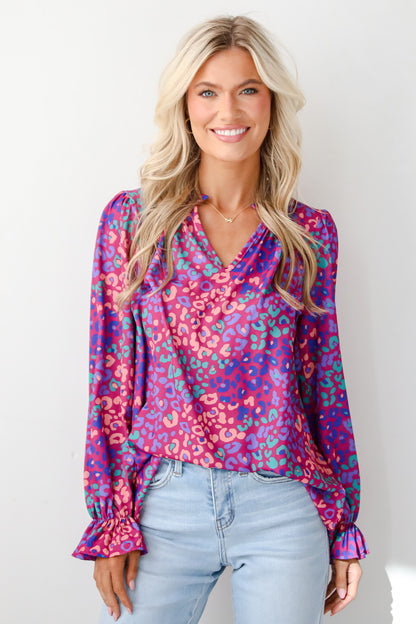 Exemplary Poise Purple Leopard Blouse