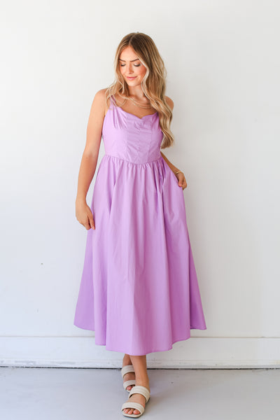 model wearing a purple Maxi Dress