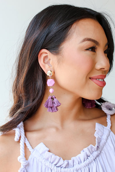 purple Tassel Statement Earrings close up
