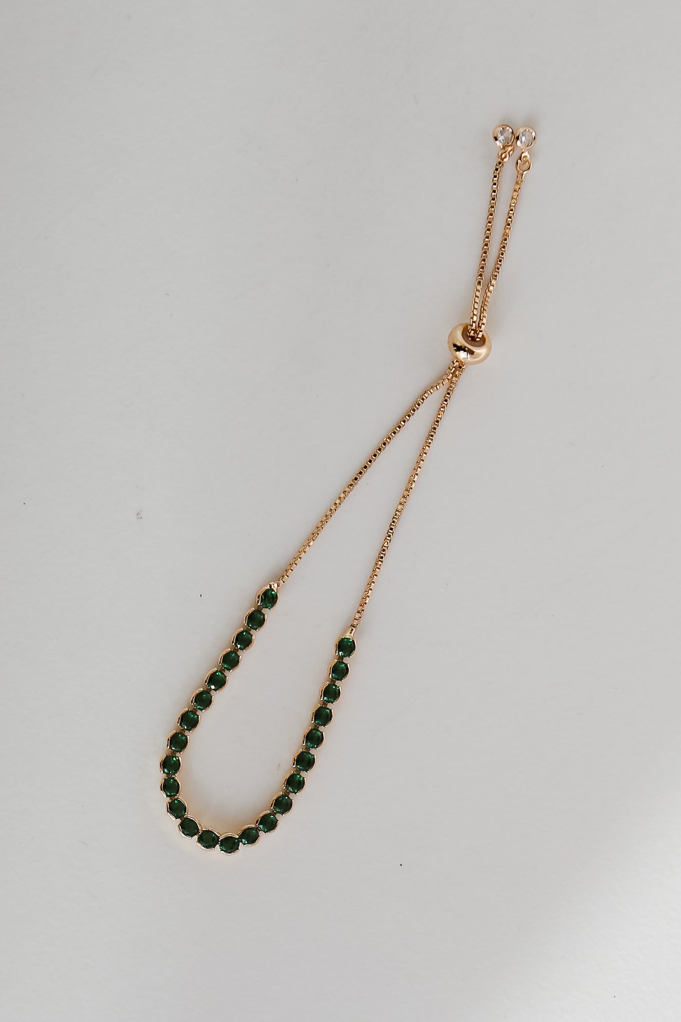 Green Rhinestone Bracelet flat lay