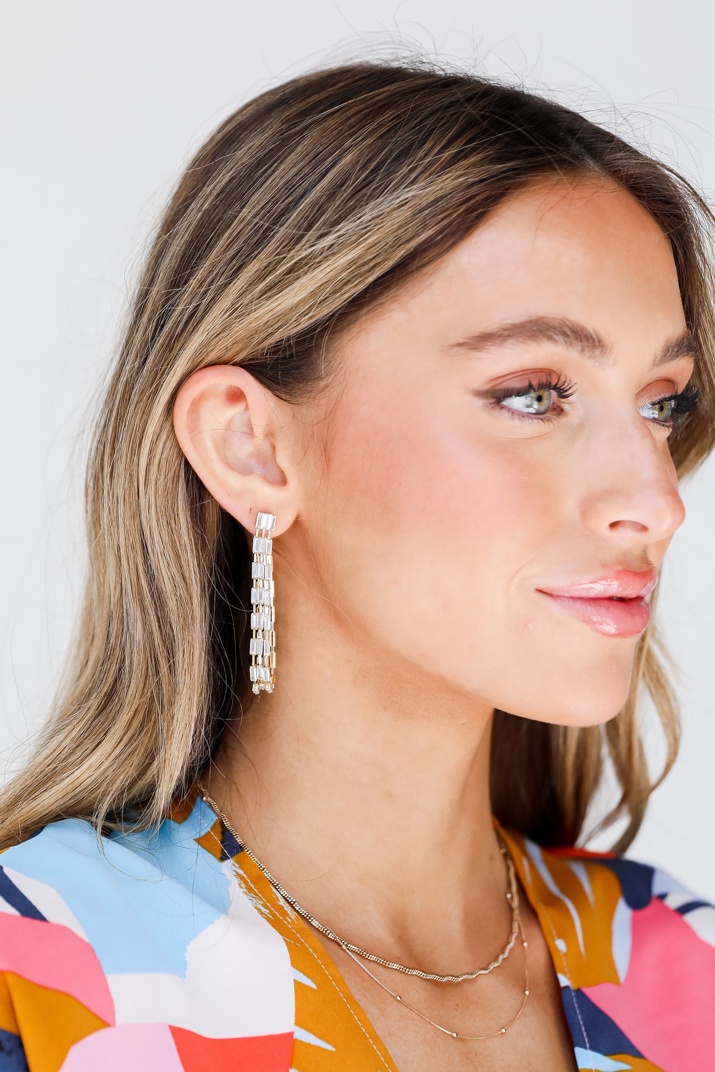 Gold Rhinestone Teardrop Hoop Earrings on model
