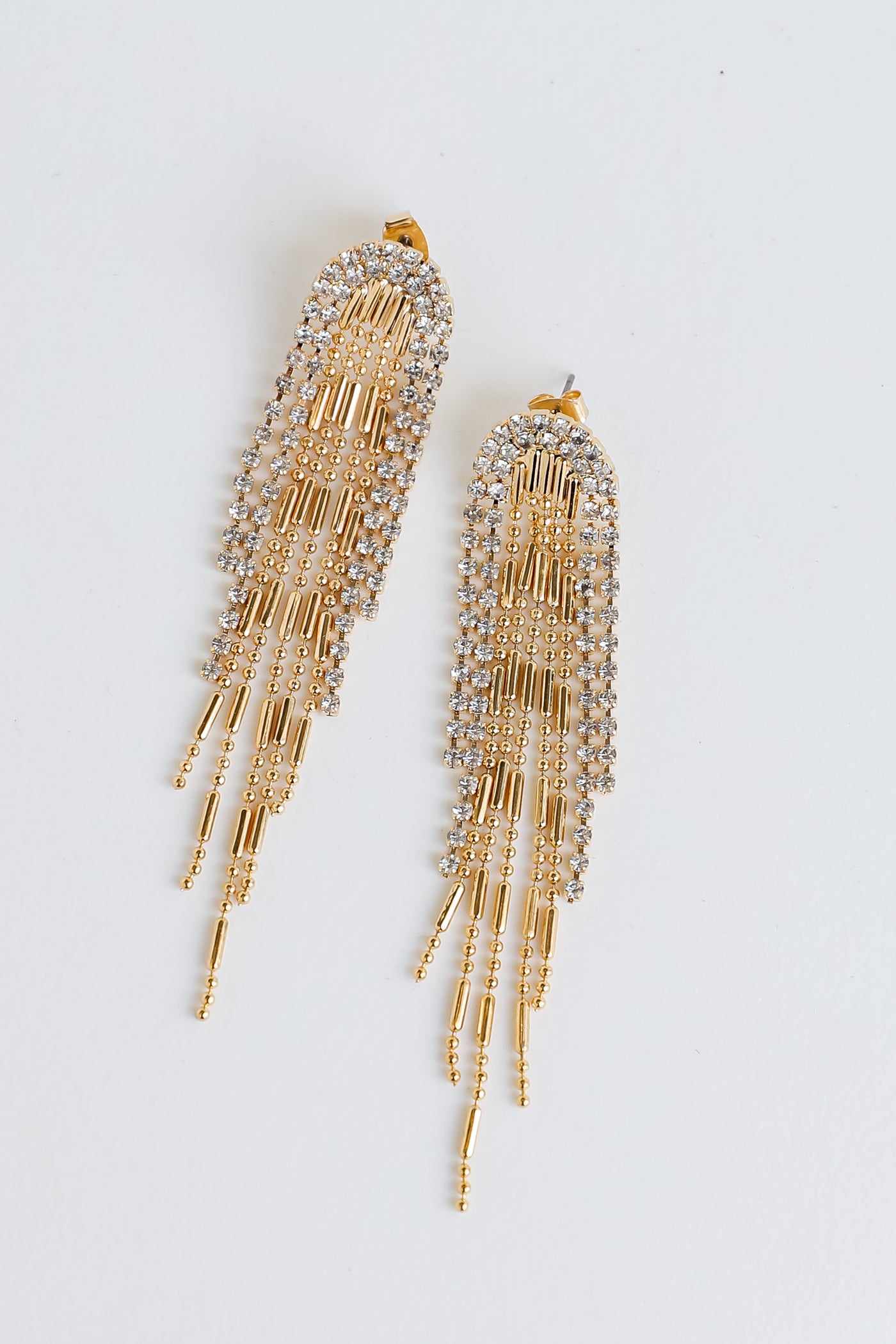 Gold Rhinestone Fringe Earrings flat lay