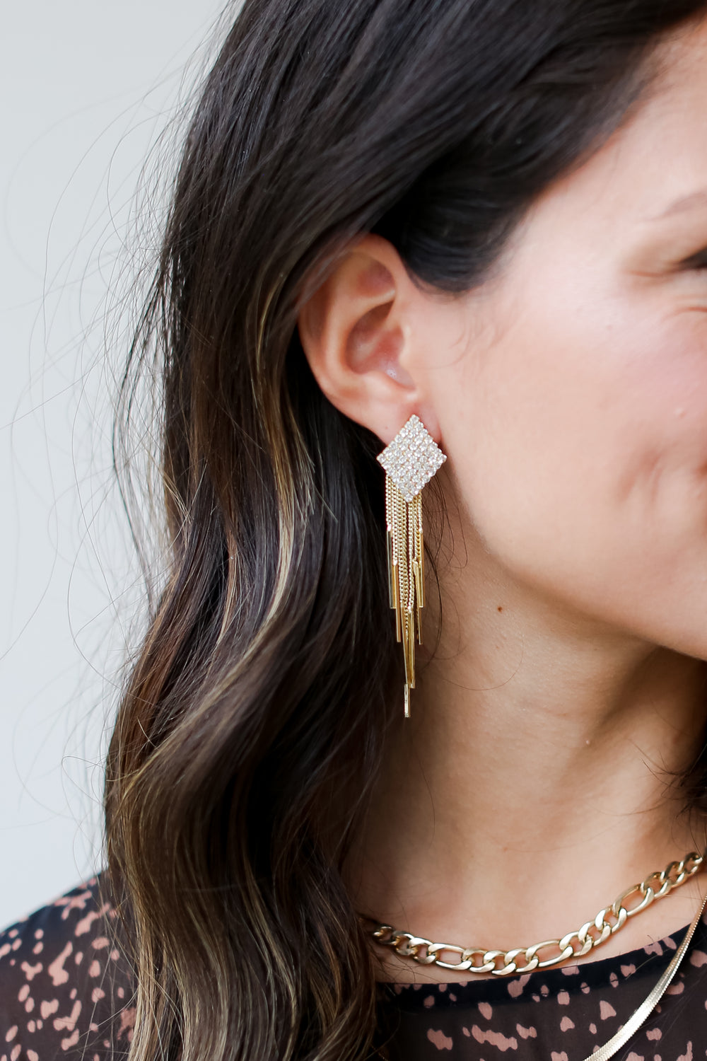 Gold Rhinestone Fringe Statement Earrings on model